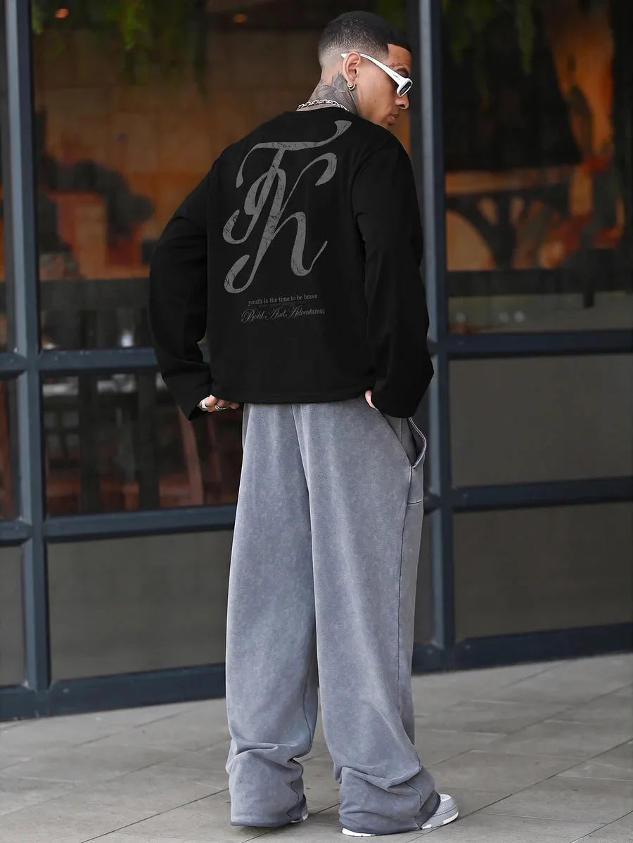 Oversized longsleeve met graphic slogan