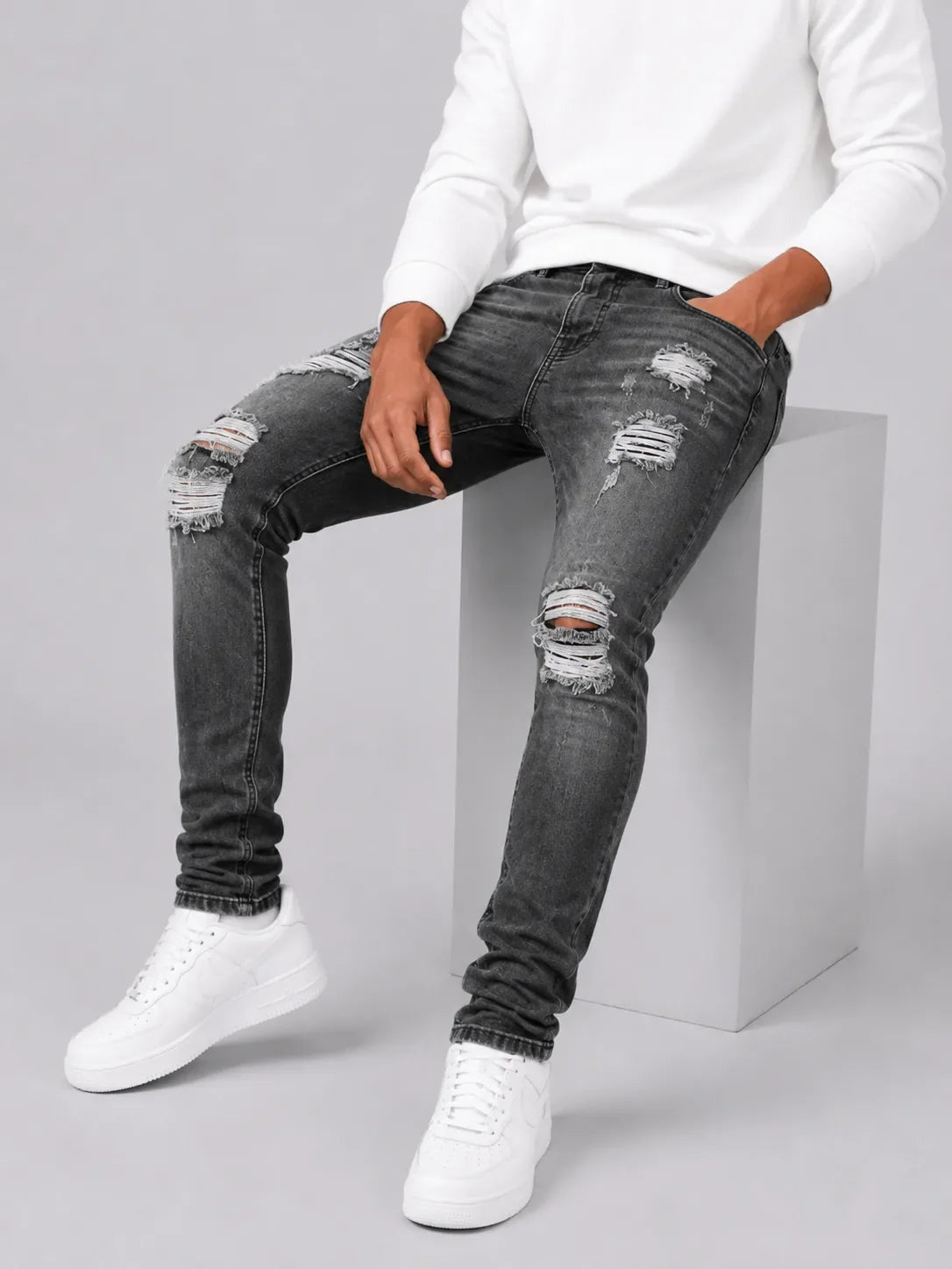 Slim fit jeans met ripped details