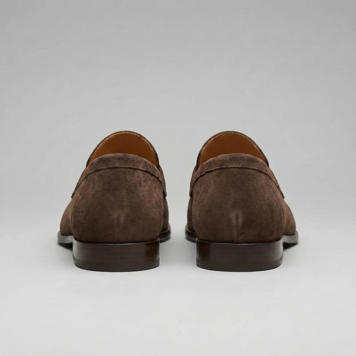 Bruine penny loafers met suède look