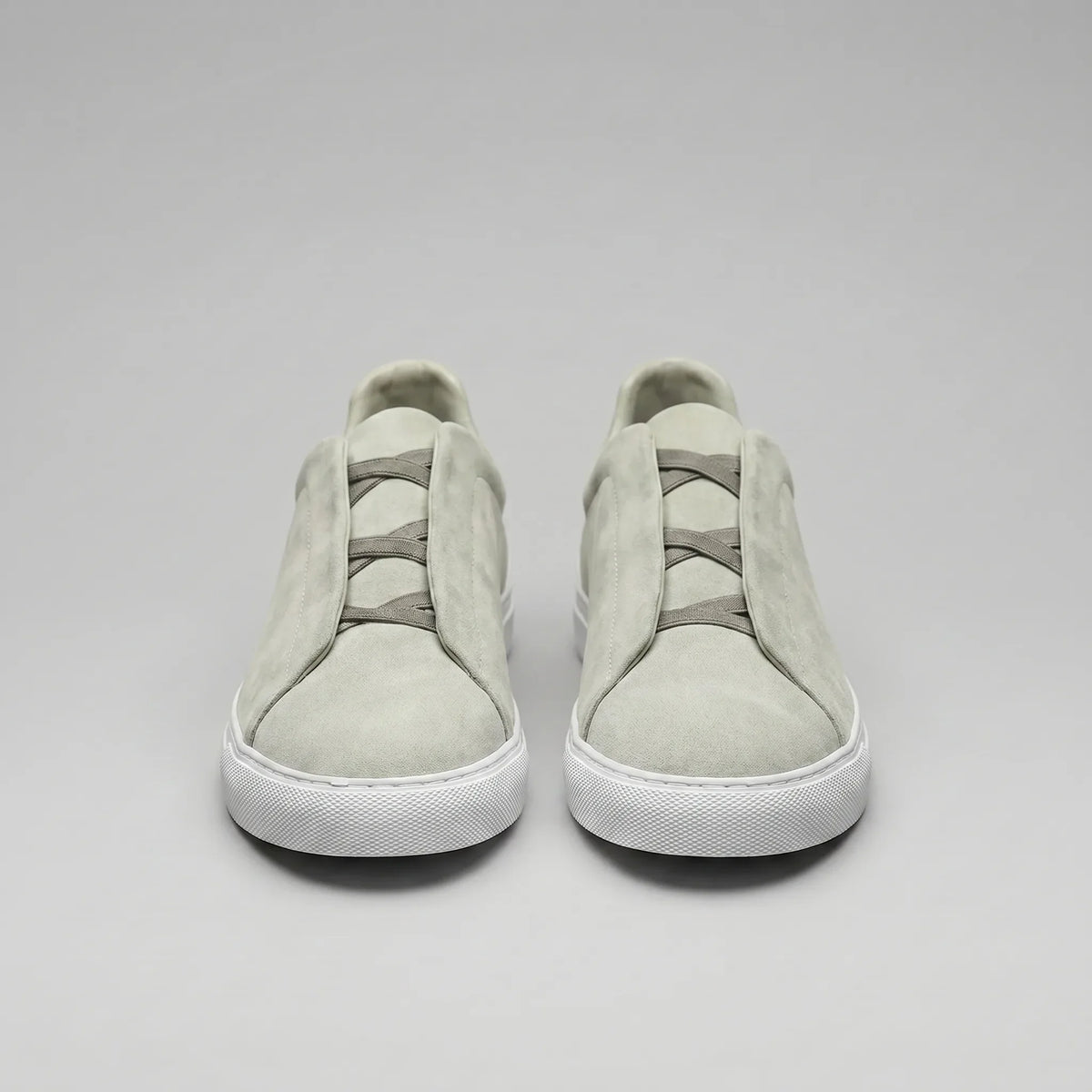 Slip-on sneakers met suède