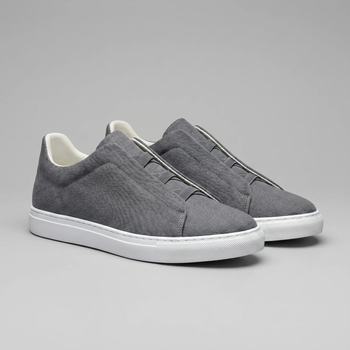 Slip-on sneakers met suède