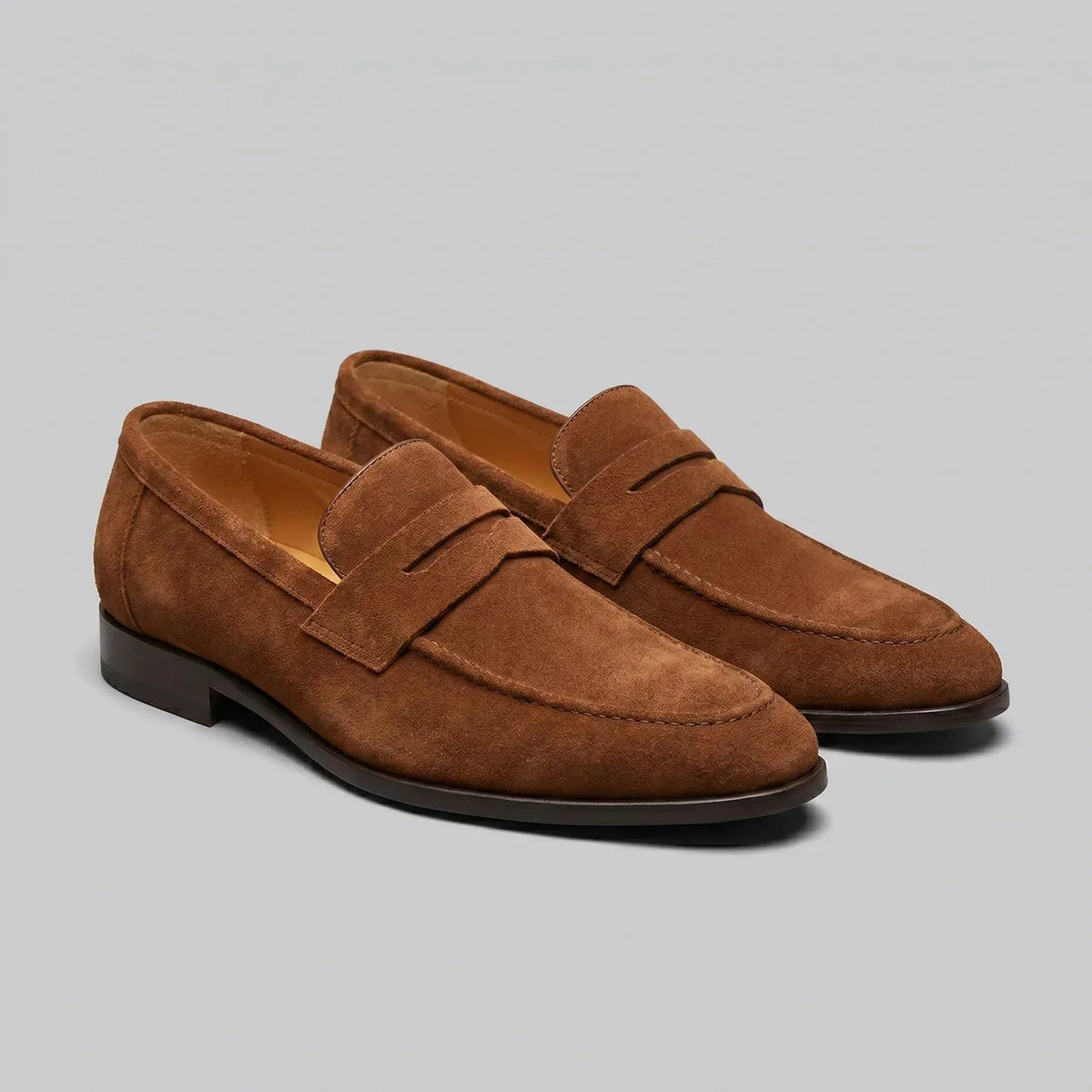 Bruine penny loafers met suède look